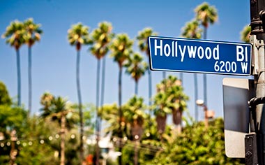 A road sign pointing towards Hollywood Boulevard, California, USA